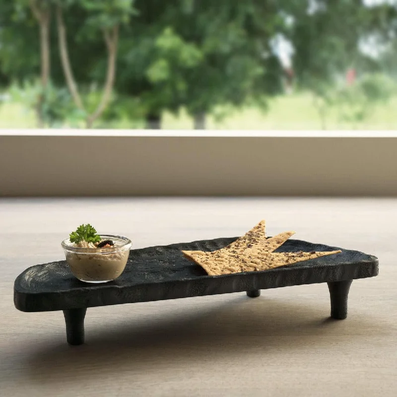 tribal mango wood platter with legs asymmetrical black